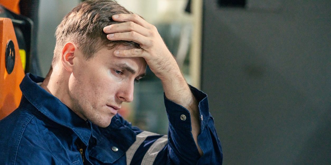 man struggling with mental health