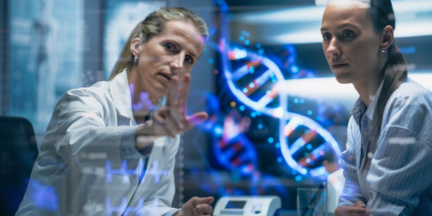 researchers looking at genetics dna