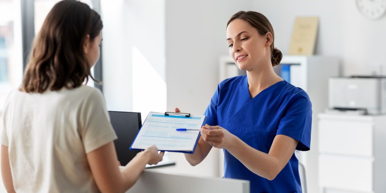 woman checking out of the hospital